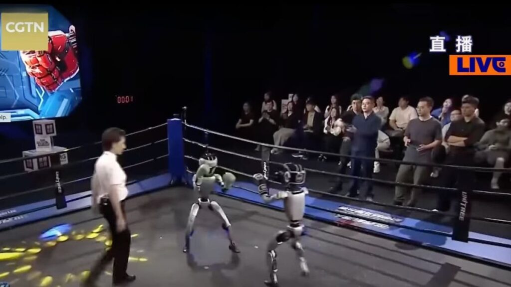 1 robots step into the ring for the first ever boxing match