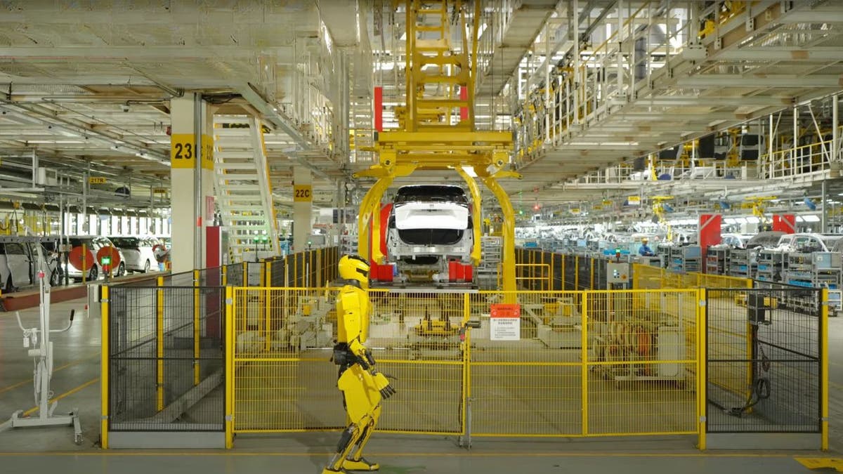 3 humanoid robots handle quality checks and assembly at auto plant