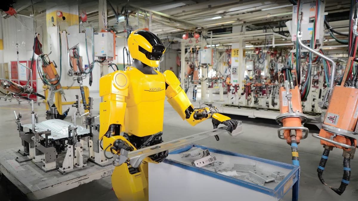 4 humanoid robots handle quality checks and assembly at auto plant