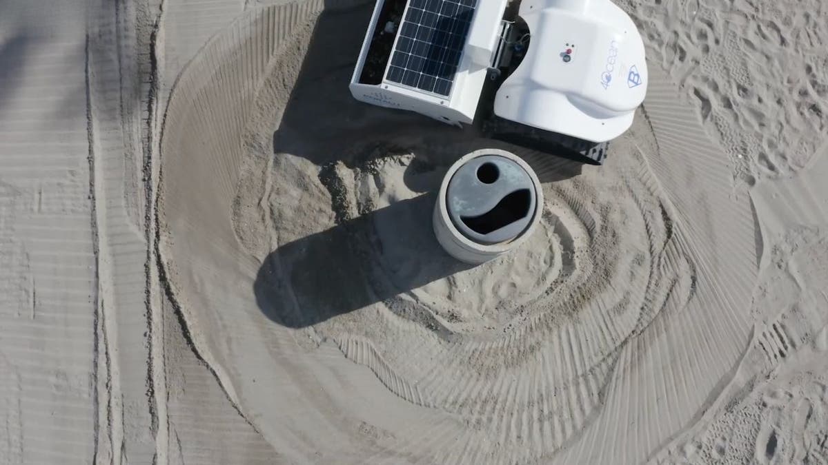 Robot cleans 32,000 square feet of beach per hour 6 robot beach cleaner 5