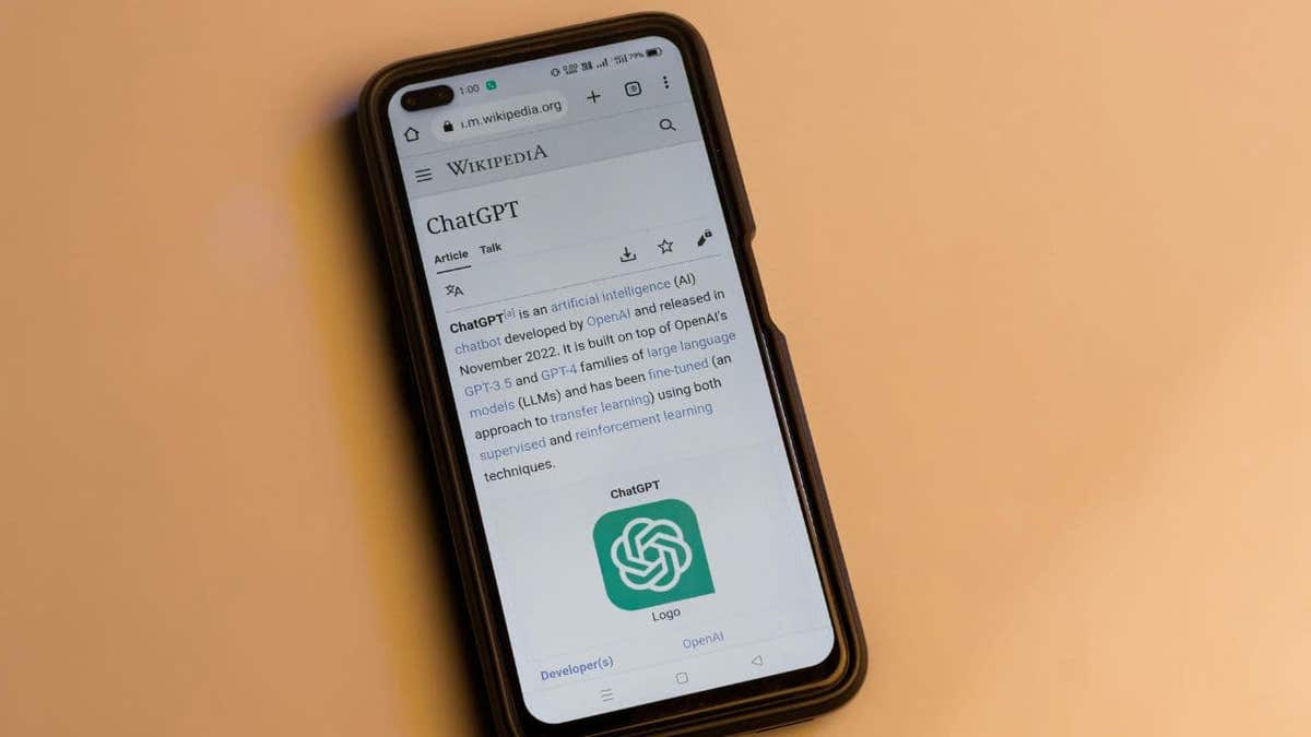 How AI chatbots are helping hackers target your banking accounts 3 Wikipedia page showing ChatGPT description on a smartphone.