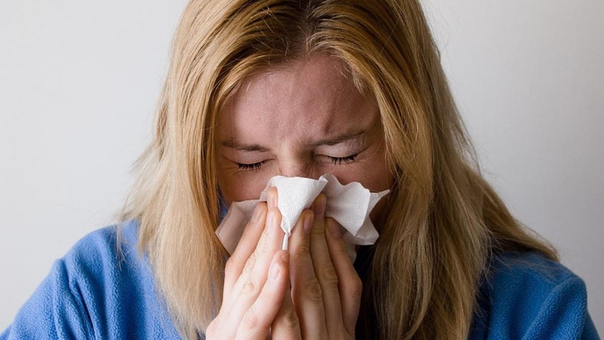 How micro-robots may soon treat your sinus infections 3 A woman with a sinus infection.