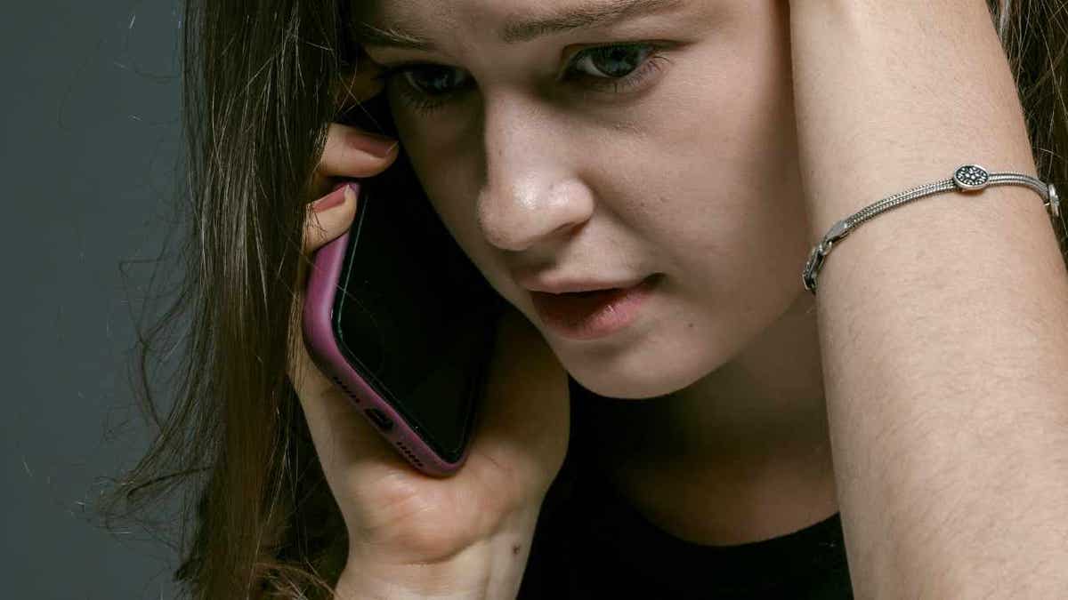 Fake agent phone scams are spreading fast across the US 4 A woman receiving a fake scam phone call.